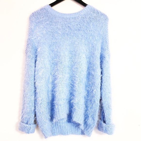 pastel blue sweater